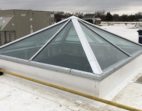 Pyramid skylight on a reflective roof