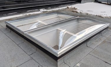 Clear Acrylic Butted Domes on Flat Roof