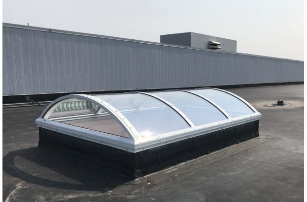 Architectural Continuous Barrel Vault Acrylic Skylight on a Flat Roof