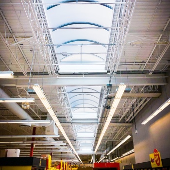 commercial skylight barrel vaulted skylight over grocery store LED lighting