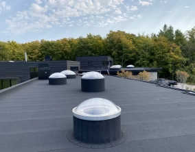 curb mounted circular skylight.