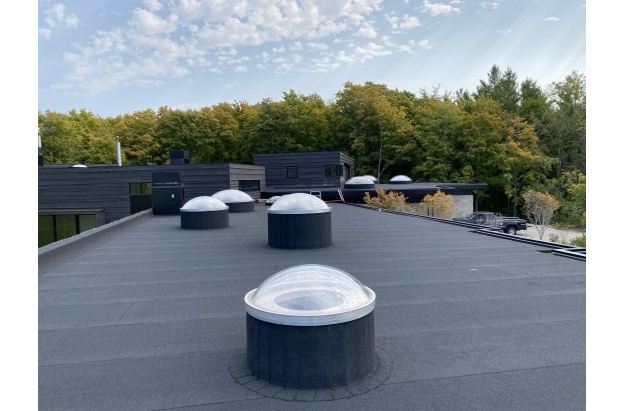 curb mounted circular skylight.