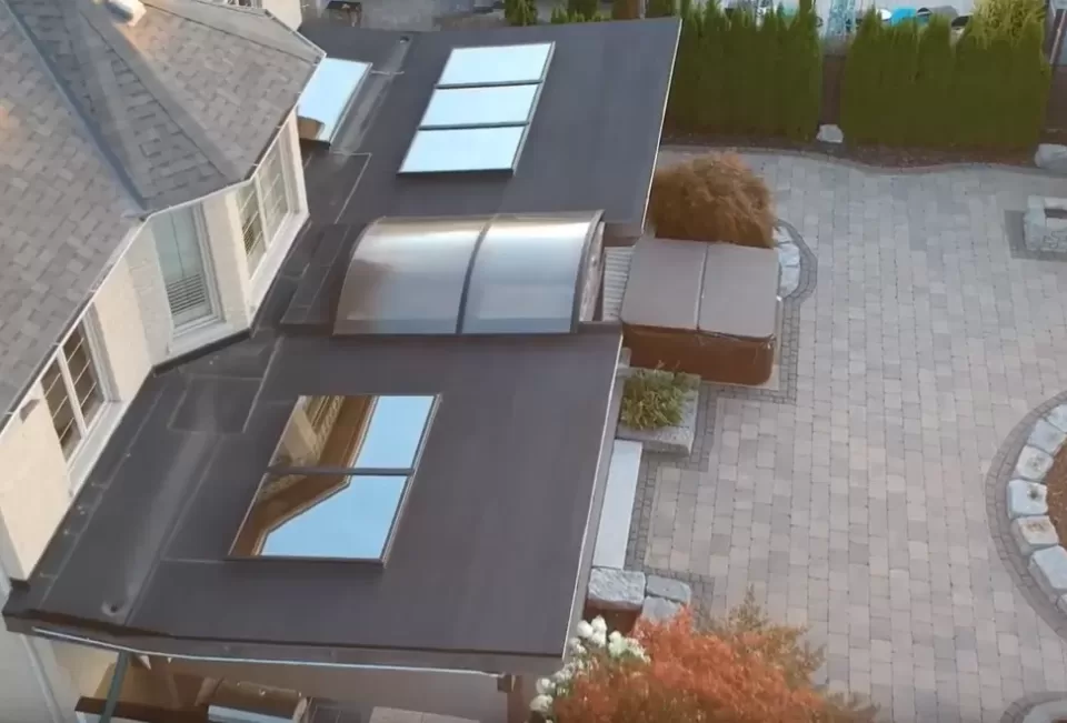 Glass and Clear Dome Skylights in a Residential Patio Setting
